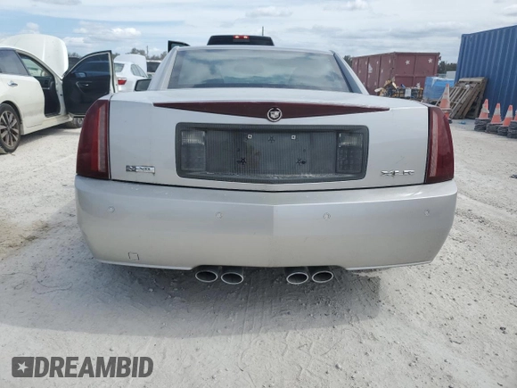 2004 Cadillac XLR z VIN 1G6YV34A945601007, wystawiony jako Copart lot #77077394 z przebiegiem Nie podano mil oraz Szkody całkowita. Historia ofert i sprzedaży dostępna na DreamBid. Obrazek 6.