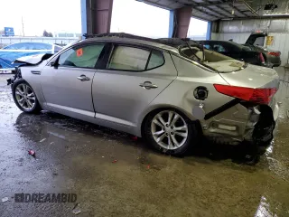 2013 Kia Optima EX с VIN 5XXGN4A70DG239393, выставлен на аукционе Copart как лот 41923615 с пробегом Не указан миль и Списание • Salvage title. История ставок и продаж доступна на DreamBid. Изображение 2.