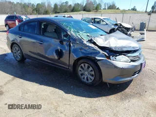 2012 Honda Civic LX z VIN 19XFB2F59CE326975, wystawiony jako IAAI lot #41734980 z przebiegiem Nie podano mil oraz . Historia ofert i sprzedaży dostępna na DreamBid. Obrazek 1.