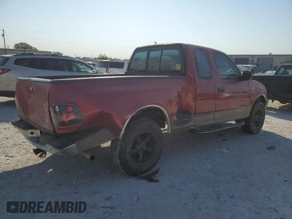 1997 Ford F-150 XL with VIN 1FTDX0721VKC14947, listed as a Copart auction lot 74887414 with 157,811 mi miles and Salvage title. Bid and sale history available at DreamBid. Image 3.