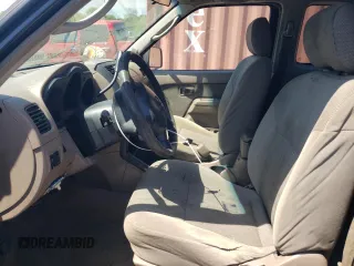 2002 Nissan Frontier XE with VIN 1N6DD26S52C330970, listed as a Copart auction lot 53129945 with 260,004 mi miles and Salvage title. Bid and sale history available at DreamBid. Image 7.