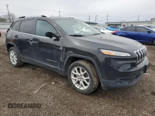 2014 Jeep Cherokee Latitude with VIN 1C4PJLCB9EW264820, listed as a Copart auction lot 49670685 with 224,915 mi miles and Salvage Title. Bid and sale history available at carsss.com. Image 4.