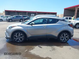 2018 Toyota C-HR XLE z VIN NMTKHMBX5JR009504, wystawiony jako IAAI lot #41776136 z przebiegiem 63 795 mil mil oraz . Historia ofert i sprzedaży dostępna na DreamBid. Obrazek 14.