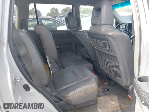 2003 Honda Pilot EX with VIN 2HKYF18593H504030, listed as a IAAI auction lot 35742950 with Not Provided miles and . Bid and sale history available at DreamBid. Image 8.