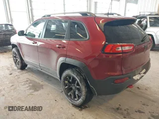 2016 Jeep Cherokee Trailhawk with VIN 1C4PJMBBXGW135138, listed as a IAAI auction lot 41595718 with 267,058 mi miles and . Bid and sale history available at DreamBid. Image 3.
