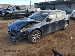 2015 Mazda 3 S Touring with VIN JM1BM1L39F1233306, listed as a Copart auction lot 88787765 with 92,358 mi miles and Salvage title. Bid and sale history available at DreamBid. Image 1.