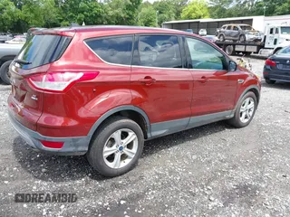 2014 Ford Escape SE z VIN 1FMCU9GX8EUC56018, wystawiony jako IAAI lot #42375937 z przebiegiem 117 341 mil mil oraz . Historia ofert i sprzedaży dostępna na DreamBid. Obrazek 4.