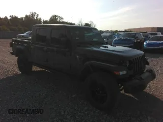2021 Jeep Gladiator 80th Anniversary with VIN 1C6HJTAG7ML619025, listed as a Copart auction lot 63309365 with 69,126 mi miles and Salvage title. Bid and sale history available at DreamBid. Image 4.
