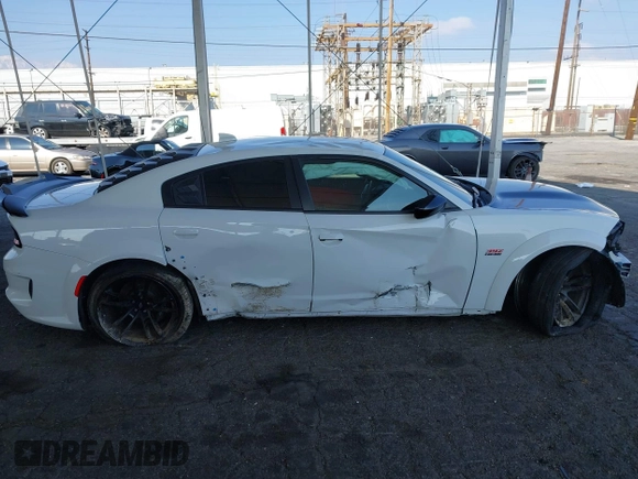 2023 Dodge Charger Scat Pack Widebody with VIN 2C3CDXGJ6PH635498, listed as a IAAI auction lot 41448100 with 13,678 mi miles and . Bid and sale history available at DreamBid. Image 14.