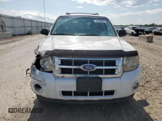 2012 Ford Escape XLT z VIN 1FMCU9DG2CKB54288, wystawiony jako Copart lot #61569655 z przebiegiem 169 899 mil mil oraz Szkoda całkowita • Salvage title. Historia ofert i sprzedaży dostępna na DreamBid. Obrazek 5.