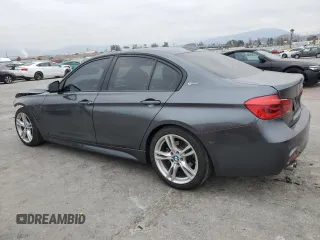 2018 BMW 3 Series 330e iPerformance with VIN WBA8E1C52JA758674, listed as a Copart auction lot 43273165 with 77,325 mi miles and Salvage Title. Bid and sale history available at carsss.com. Image 2.