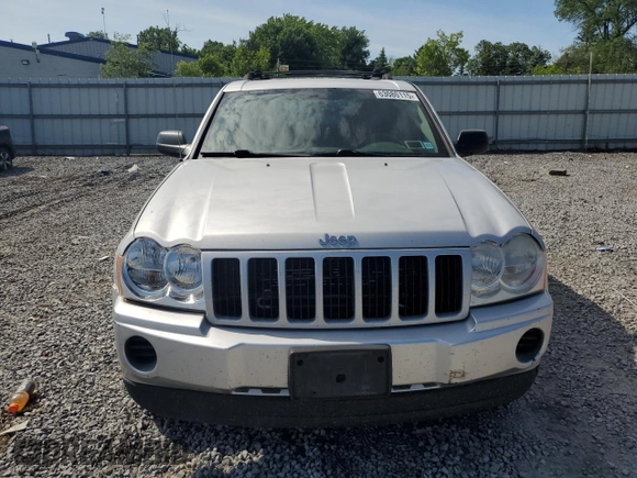 2005 Jeep Grand Cherokee Laredo with VIN 1J4GR48KX5C565762, listed as a Copart auction lot 63080115 with 122,349 mi miles and Salvage title. Bid and sale history available at DreamBid. Image 5.