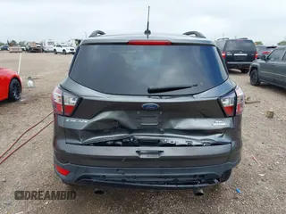 2017 Ford Escape SE with VIN 1FMCU0G99HUC65571, listed as a IAAI auction lot 41923517 with 77,179 mi miles and . Bid and sale history available at DreamBid. Image 16.