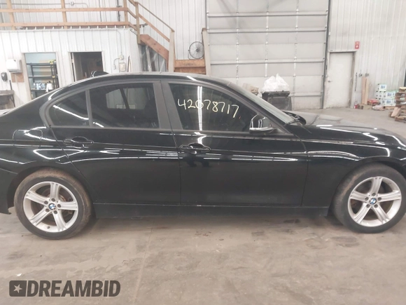 2014 BMW 3 Series 328i xDrive with VIN WBA3B3C5XEJ980450, listed as a IAAI auction lot 42078717 with 108,763 mi miles. Bid and sale history available at carsss.com. Image 14.