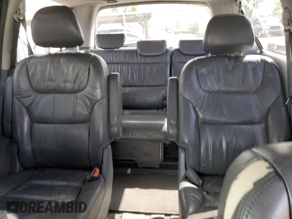 2005 Honda Odyssey EX-L z VIN 5FNRL38655B408107, wystawiony jako Copart lot #50918155 z przebiegiem 215 920 mil mil oraz Szkoda całkowita • Salvage title. Historia ofert i sprzedaży dostępna na DreamBid. Obrazek 10.