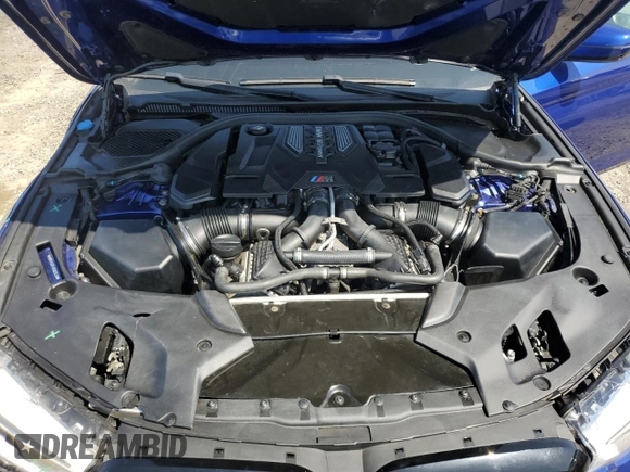 2018 BMW M5 z VIN WBSJF0C51JB282030, wystawiony jako Copart lot #54773835 z przebiegiem 44 046 mil mil oraz Szkody całkowita. Historia ofert i sprzedaży dostępna na DreamBid. Obrazek 11.