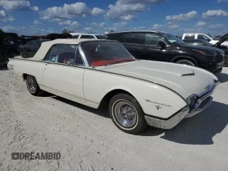 1961 Ford Thunderbird with VIN 1Y73Z112797, listed as a Copart auction lot 77574894 with 22,246 mi miles and Salvage Title. Bid and sale history available at DreamBid. Image 4.