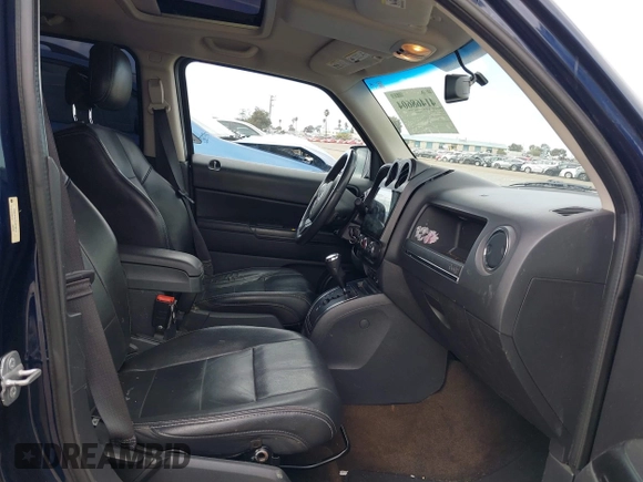2014 Jeep Patriot High Altitude with VIN 1C4NJPFA7ED674612, listed as a IAAI auction lot 41468604 with 86,759 mi miles and . Bid and sale history available at carsss.com. Image 5.
