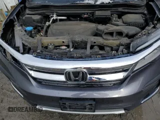 2020 Honda Pilot Touring 7-Passenger with VIN 5FNYF6H60LB039609, listed as a Copart auction lot 51753425 with 57,512 mi miles and Salvage title. Bid and sale history available at DreamBid. Image 12.