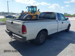1999 Ford F-150 with VIN 1FTRX17W6XNB60822, listed as a IAAI auction lot 42310975 with Not provided miles and . Bid and sale history available at DreamBid. Image 4.