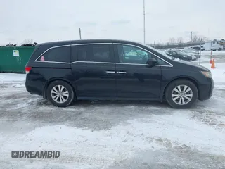 2015 Honda Odyssey EX-L with VIN 5FNRL5H60FB018030, listed as a IAAI auction lot 41608357 with 166,214 mi miles and . Bid and sale history available at carsss.com. Image 13.