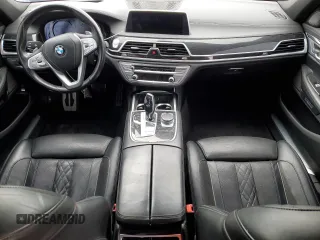 2018 BMW 7 Series 750i with VIN WBA7F0C55JGM23537, listed as a Copart auction lot 76824074 with 64,682 mi miles and Salvage Title. Bid and sale history available at carsss.com. Image 8.