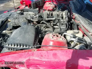 2006 Ford Mustang Standard z VIN 1ZVHT80N265219636, wystawiony jako IAAI lot #43246225 z przebiegiem 124 142 mil mil oraz . Historia ofert i sprzedaży dostępna na DreamBid. Obrazek 21.