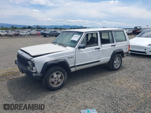 1993 Jeep Cherokee z VIN 1J4FT28PXPL560996, wystawiony jako IAAI lot #42526590 z przebiegiem 304 201 mil mil oraz . Historia ofert i sprzedaży dostępna na DreamBid. Obrazek 2.