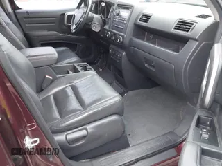 2009 Honda Ridgeline RTL with VIN 5FPYK16529B100032, listed as a IAAI auction lot 41206781 with 130,694 mi miles and . Bid and sale history available at DreamBid. Image 5.