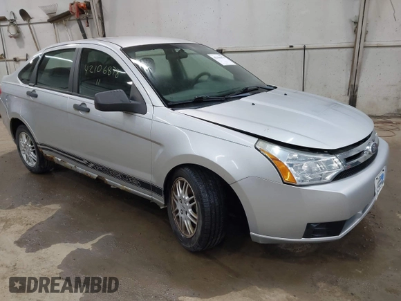 2011 Ford Focus SE with VIN 1FAHP3FN1BW120916, listed as a IAAI auction lot 42106878 with 107,166 mi miles. Bid and sale history available at carsss.com. Image 1.