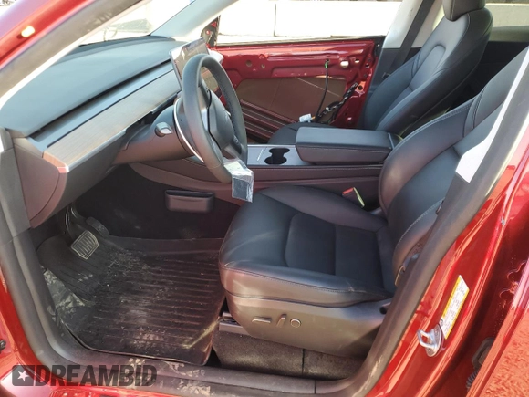 2024 Tesla Model Y Long Range with VIN 7SAYGDEE4RA257722, listed as a Copart auction lot 54577865 with 10,713 mi miles and Salvage Title. Bid and sale history available at DreamBid. Image 7.