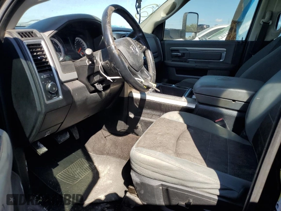 2014 Ram 2500 SLT with VIN 3C6UR5DL9EG145475, listed as a Copart auction lot 68456504 with 210,277 mi miles and Salvage title. Bid and sale history available at DreamBid. Image 7.