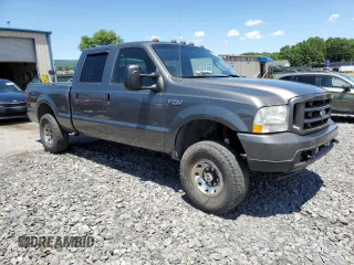 2004 Ford F-250 XL with VIN 1FTNW21L14EA16600, listed as a Copart auction lot 62814805 with 222,493 mi miles and Salvage title. Bid and sale history available at DreamBid. Image 4.