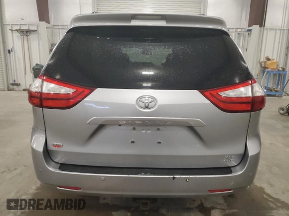 2017 Toyota Sienna XLE with VIN 5TDDZ3DC4HS166141, listed as a Copart auction lot 64357715 with 124,184 mi miles and Salvage title. Bid and sale history available at DreamBid. Image 6.