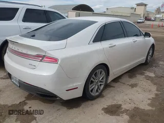 2015 Lincoln MKZ with VIN 3LN6L2G97FR616137, listed as a IAAI auction lot 41920939 with 180,004 mi miles. Bid and sale history available at carsss.com. Image 4.