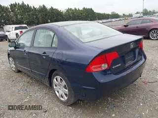 2006 Honda Civic LX with VIN 1HGFA16546L005906, listed as a IAAI auction lot 42182142 with 167,663 mi miles and . Bid and sale history available at DreamBid. Image 3.