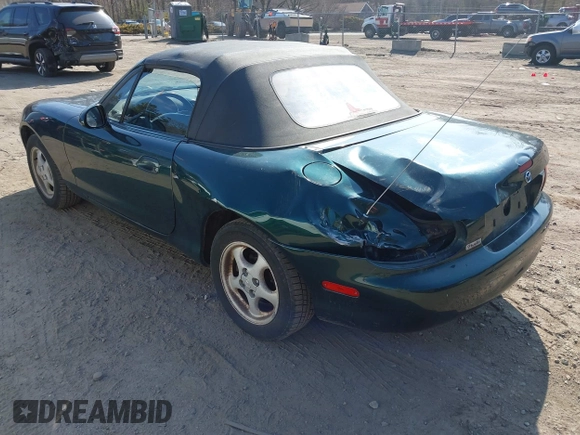 1999 Mazda MX-5 Miata with VIN JM1NB3537X0109618, listed as a IAAI auction lot 41795736 with 160,452 mi miles and . Bid and sale history available at DreamBid. Image 3.