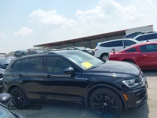 2021 Volkswagen Tiguan SE z VIN 3VV3B7AX0MM047478, wystawiony jako IAAI lot #42144239 z przebiegiem 55 468 mil mil oraz . Historia ofert i sprzedaży dostępna na DreamBid. Obrazek 14.