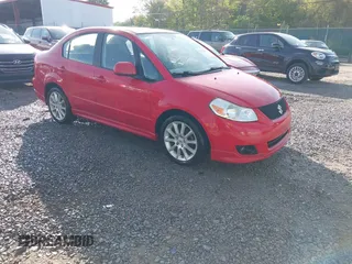 2011 Suzuki SX4 z VIN JS2YC5A46B6300253, wystawiony jako IAAI lot #42207486 z przebiegiem 204 247 mil mil oraz . Historia ofert i sprzedaży dostępna na DreamBid. Obrazek 1.