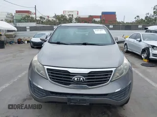 2013 Kia Sportage LX with VIN KNDPBCA23D7529658, listed as a IAAI auction lot 42473877 with 114,797 mi miles and . Bid and sale history available at DreamBid. Image 12.