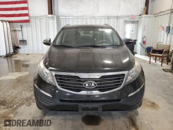 2012 Kia Sportage LX z VIN KNDPB3A24C7179584, wystawiony jako Copart lot #60938465 z przebiegiem 161 362 mil mil oraz Czysty tytuł • Clean title. Historia ofert i sprzedaży dostępna na DreamBid. Obrazek 5.