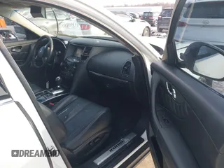 2015 Infiniti QX70 with VIN JN8CS1MW4FM481257, listed as a IAAI auction lot 41390187 with 127,892 mi miles and . Bid and sale history available at DreamBid. Image 5.