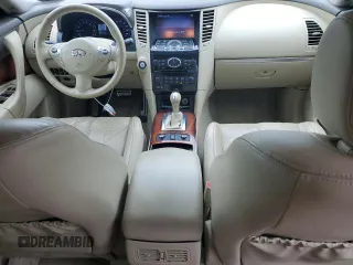 2014 Infiniti QX70 with VIN JN8CS1MW7EM412867, listed as a Copart auction lot 60054195 with 148,064 mi miles and Salvage title. Bid and sale history available at DreamBid. Image 8.