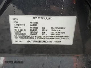 2024 Tesla Model Y z VIN 7SAYGDEDXRF076893, wystawiony jako Copart lot #57966515 z przebiegiem 9 200 mil mil oraz Szkoda całkowita • Salvage title. Historia ofert i sprzedaży dostępna na DreamBid. Obrazek 13.