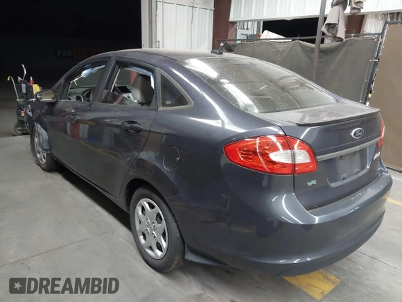 2013 Ford Fiesta SE z VIN 3FADP4BJ1DM186232, wystawiony jako IAAI lot #42304613 z przebiegiem 105 919 mil mil oraz . Historia ofert i sprzedaży dostępna na DreamBid. Obrazek 3.