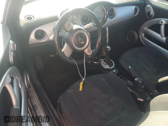 2005 MINI Convertible with VIN WMWRF33465TG10044, listed as a Copart auction lot 50364235 with 152,186 mi miles and Salvage title. Bid and sale history available at DreamBid. Image 8.