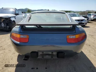 1989 Porsche 928 z VIN WP0JB0925KS860924, wystawiony jako Copart lot #51871105 z przebiegiem Nie podano mil oraz Szkody całkowita. Historia ofert i sprzedaży dostępna na DreamBid. Obrazek 6.