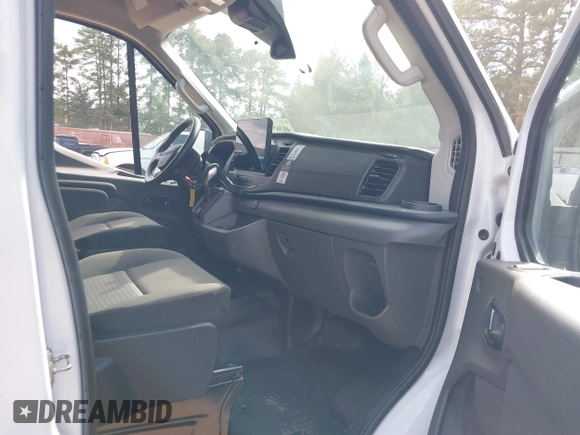 2022 Ford Transit Cargo with VIN 1FTBR1C84NKA76483, listed as a IAAI auction lot 40365786 with 28,854 mi miles and . Bid and sale history available at DreamBid. Image 5.