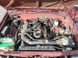 1992 Toyota Pickup DLX z VIN JT4RN93P1N5052818, wystawiony jako Copart lot #77344244 z przebiegiem 484 357 mil mil oraz Szkoda całkowita • Salvage title. Historia ofert i sprzedaży dostępna na DreamBid. Obrazek 11.