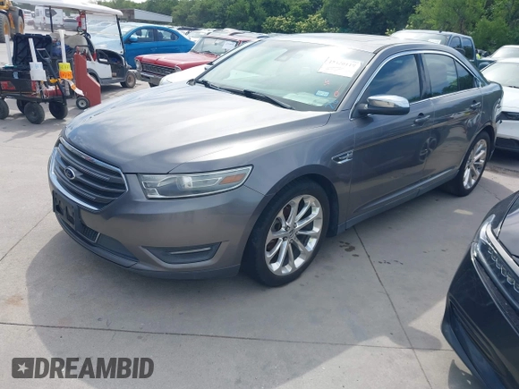 2014 Ford Taurus Limited z VIN 1FAHP2F82EG127439, wystawiony jako IAAI lot #42320119 z przebiegiem 191 876 mil mil oraz . Historia ofert i sprzedaży dostępna na DreamBid. Obrazek 2.